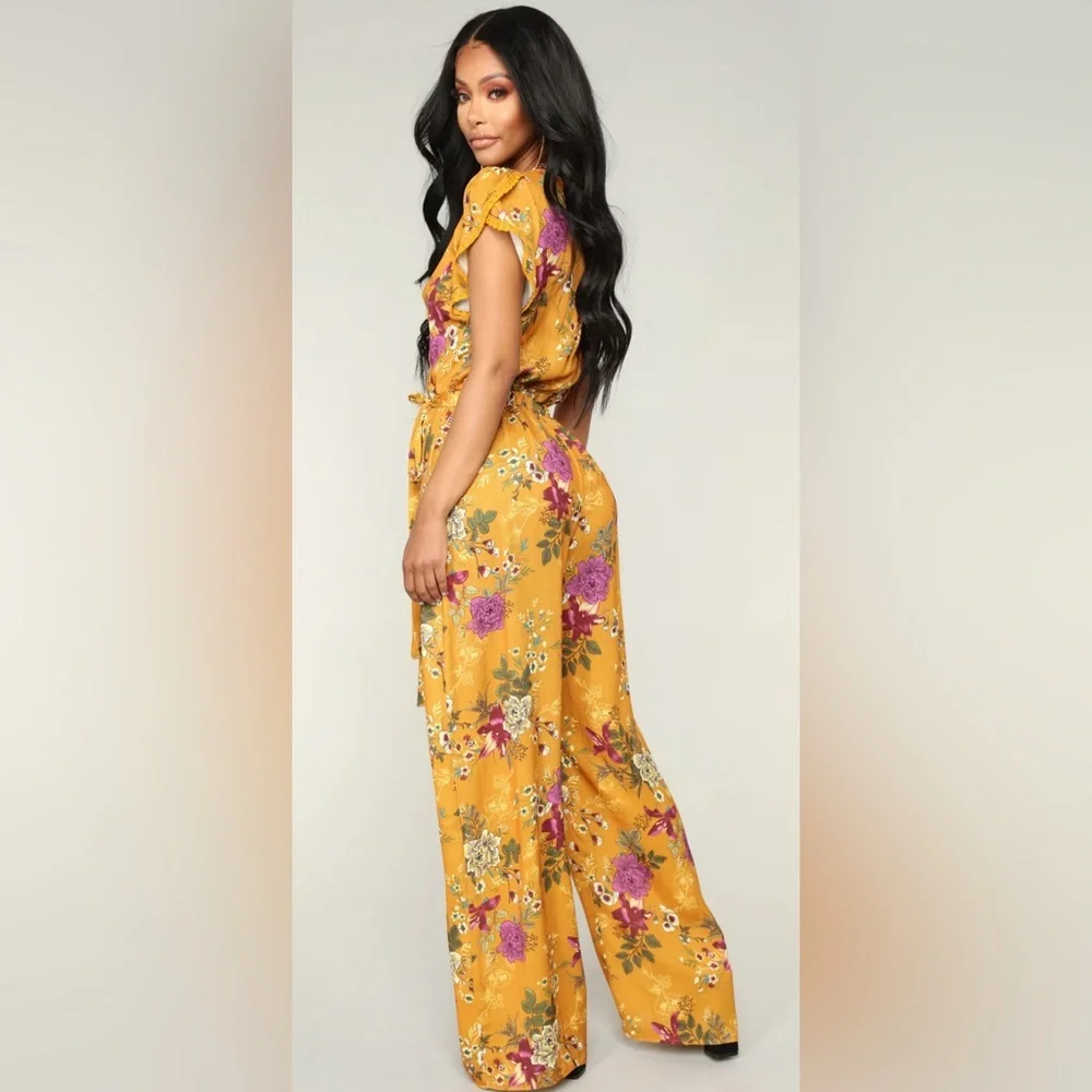 Fashion Nova Yellow Floral Jumpsuit with V-Neck and Wide-Leg Design - Picture 4 of 7